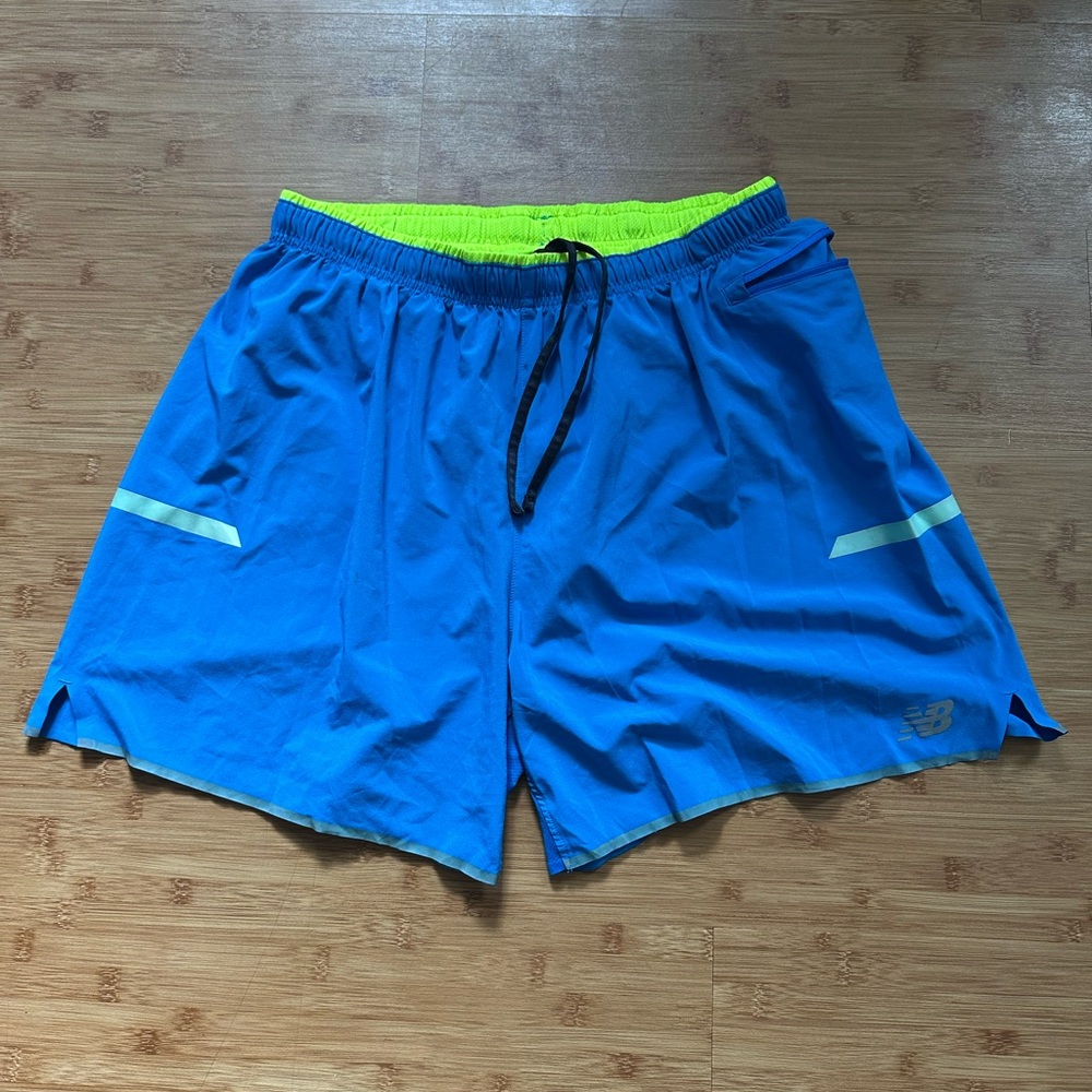 New Balance Blue and Yellow Athletic Shorts with Reflective Details